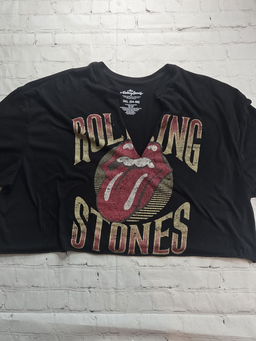 the Rolling Stones Black Kids Tee with Red Tongue and Gold Lettering